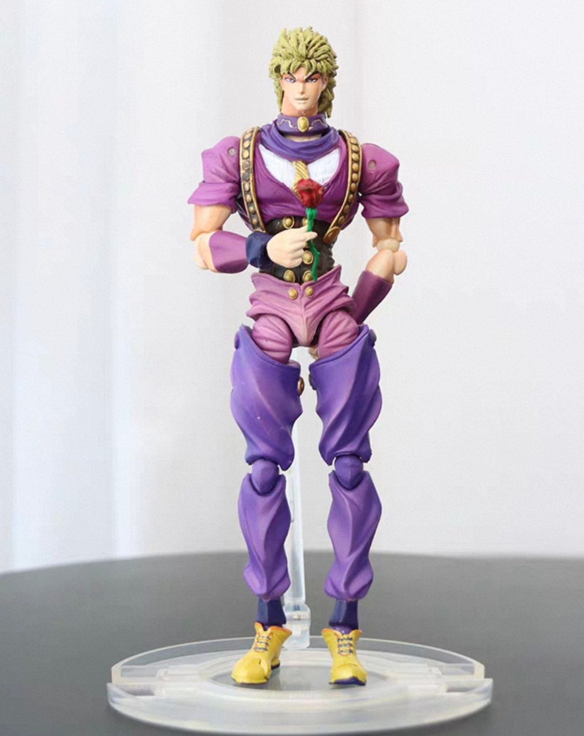 JoJo Dio Brando statue, front standing pose on the round base showing the detailed purple costume and blond hair sculpt in full body view