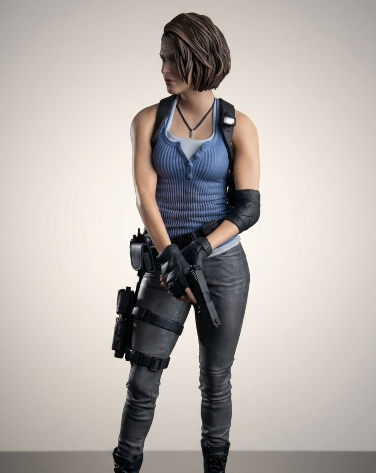 Resident Evil Jill Valentine statue three-quarter angle, showing the poseable weapon and combat gear detailing