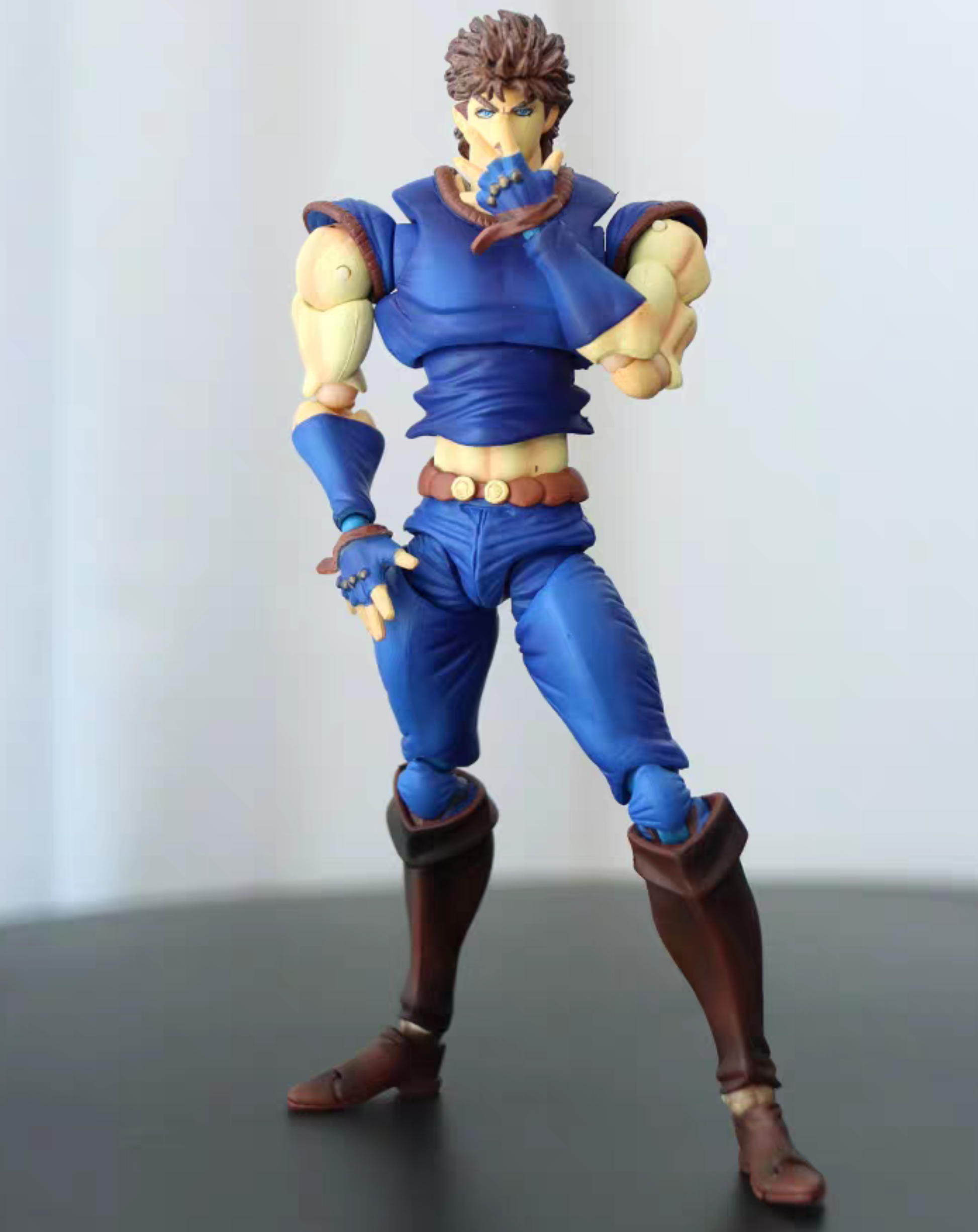 JoJo Jonathan Joestar statue, front standing pose with arms raised, detailed blue costume and muscular sculpt shown in full body view