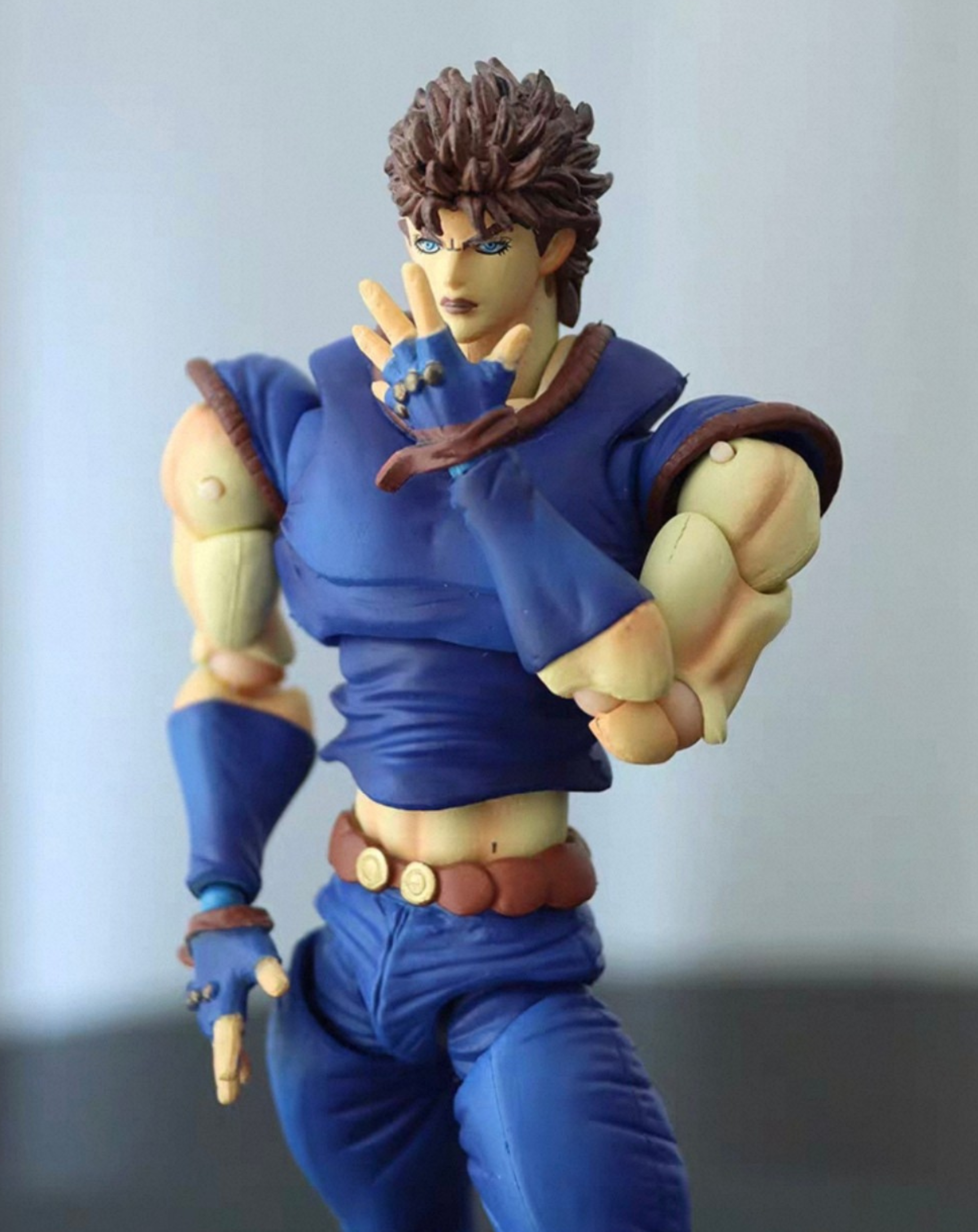 JoJo Bizarre Adventure Jonathan Joestar collectible statue, front view with one hand on hip highlighting the detailed costume sculpt