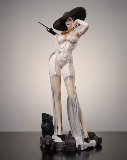 A collectible figurine of a Lady Dimitrescu from Resident Evil  in a white lingerie set with sheer stockings, a large black hat, standing on a dark base against a neutral studio background.