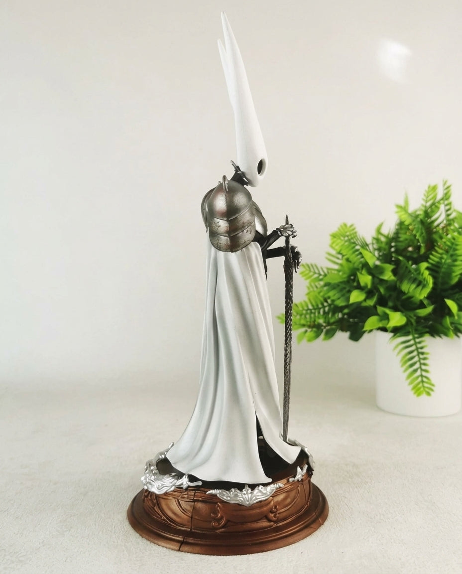 Pure Vessel Hollow Knight figure detail, showing the pale flowing cloak and dark under-layers of the 30cm statue