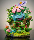 Venusaur flower dinosaur statue 31cm front view with pink bloom and forest diorama base