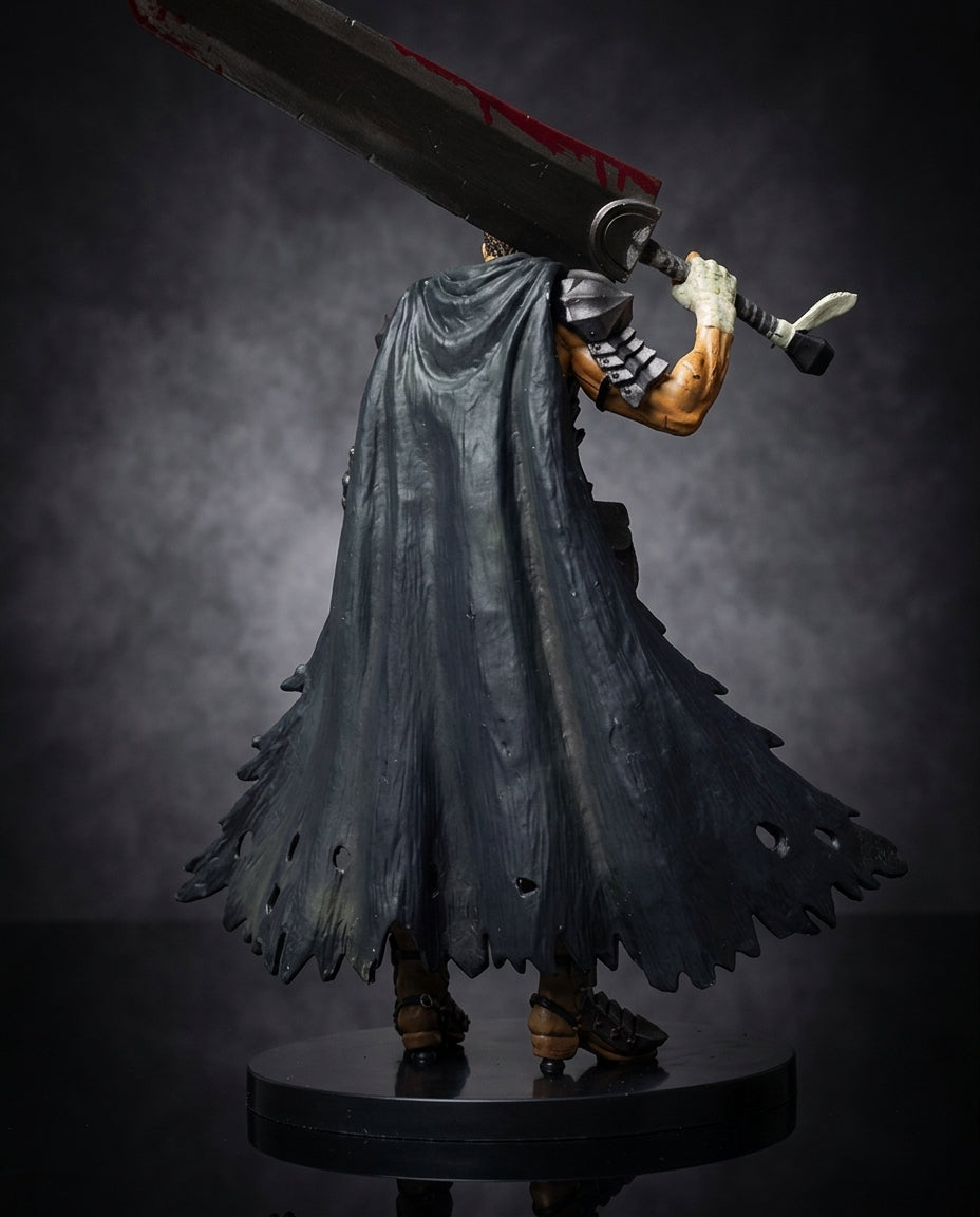 Black Swordsman Guts figure in full body view, the tattered black cape spread wide behind him and the Dragonslayer greatsword in hand