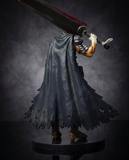 Black Swordsman Guts figure in full body view, the tattered black cape spread wide behind him and the Dragonslayer greatsword in hand