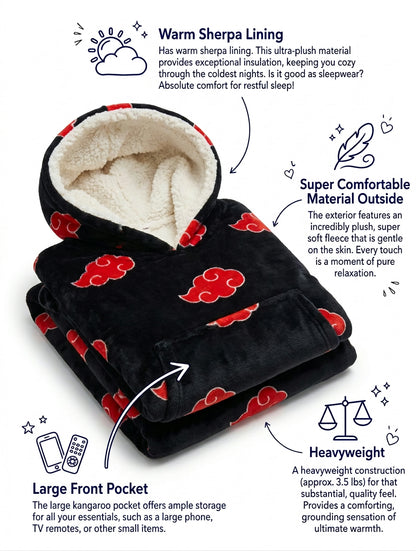 Folded black blanket hoodie with red clouds and sherpa lined hood, feature detail view with front pocket