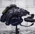 Ghost MW2 tactical helmet replica with NVG mount and rail system, side profile view on display stand, black and grey colorway