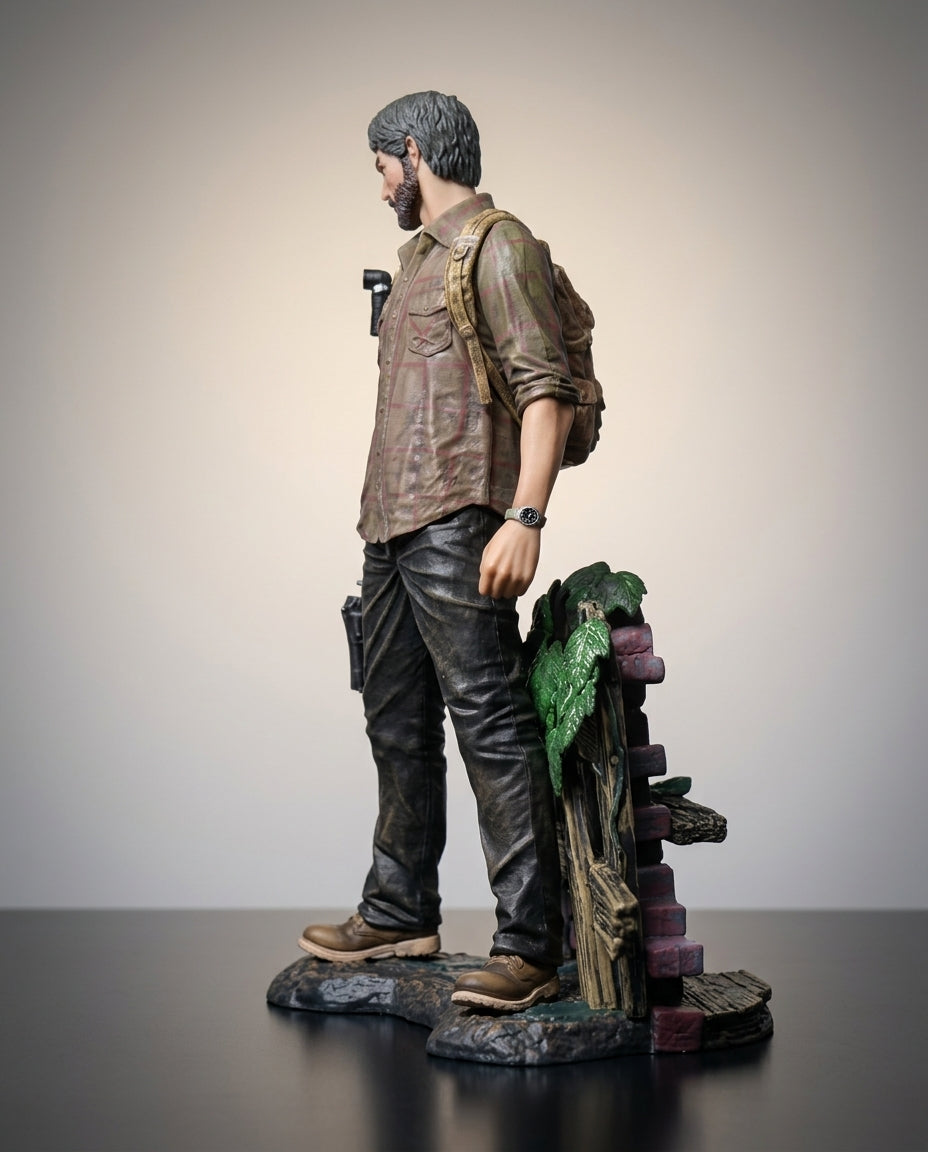 The Last of Us Joel statue three-quarter view beside the brick and foliage base detail, 19cm collectible figure