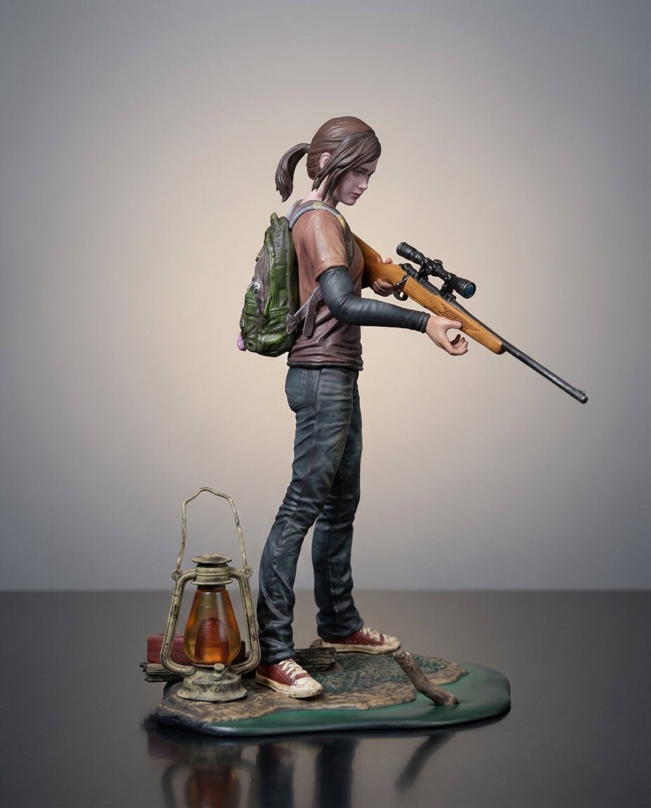 The Last of Us Ellie figure aiming her rifle, dynamic front three-quarter view of the 19cm collectible statue