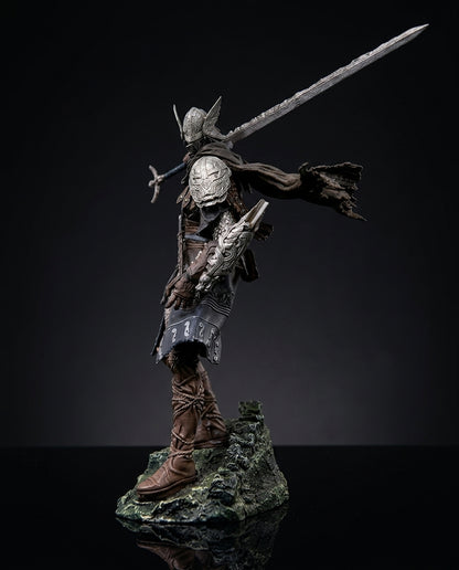 Side angle view of the Wylder collectible figurine captured mid-combat pose, highlighting the dynamic weapon stance and intricate armor plating sculpted along the shoulders and torso