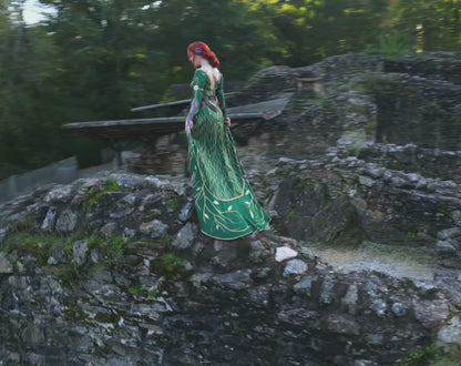 Triss Merigold cosplay video showing full outfit movement in forest setting
