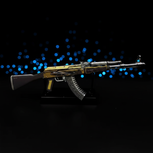 CS2 AK47 Fuel Injector mini replica on display stand, rich gold and yellow mechanical-patterned skin under blue bokeh studio lighting