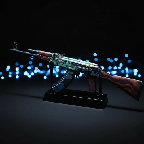 CS2 AK47 Fire Serpent mini replica on display stand, iconic orange and red dragon skin under dramatic blue studio lighting