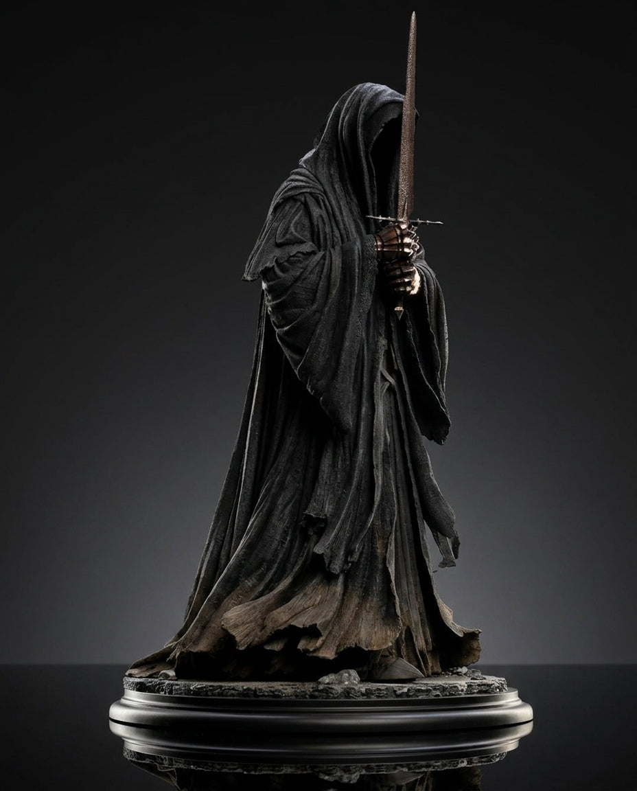 Side angle view of the Ringwraith of Mordor collectible statue highlighting the sword and cloak drape