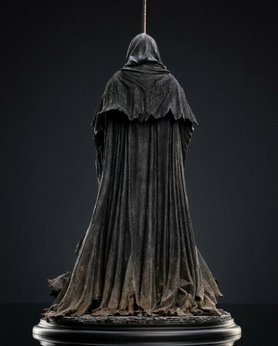 Back view of the Ringwraith of Mordor figurine showing the flowing cloak silhouette and weathered fabric sculpting