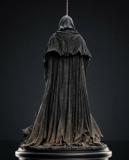 Back view of the Ringwraith of Mordor figurine showing the flowing cloak silhouette and weathered fabric sculpting