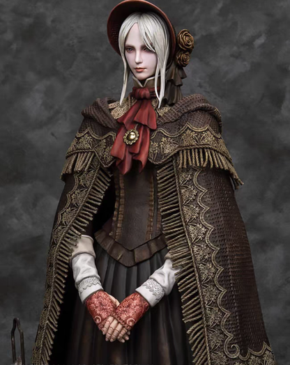Close-up detail shot of The Doll figurine's hand-painted face, bonnet, and red ribbon accent sculpted with fine precision