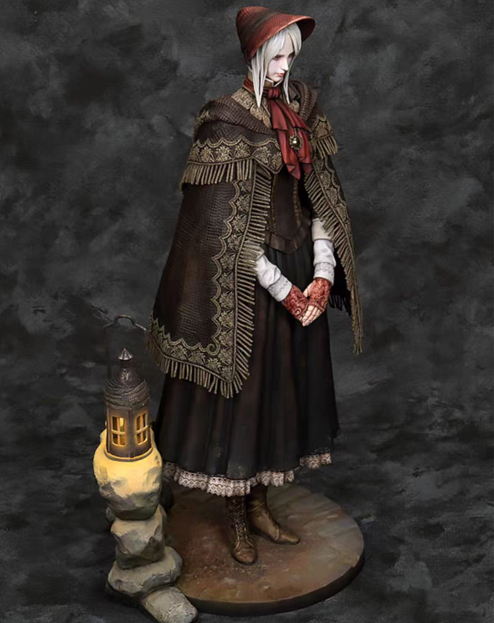 Side profile view of The Doll Bloodborne statue highlighting the cloak silhouette and lantern accessory hanging at her side
