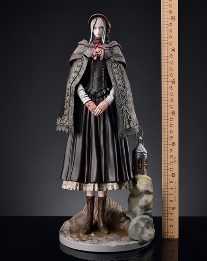 The Doll Bloodborne figurine shown beside a ruler for scale and size reference